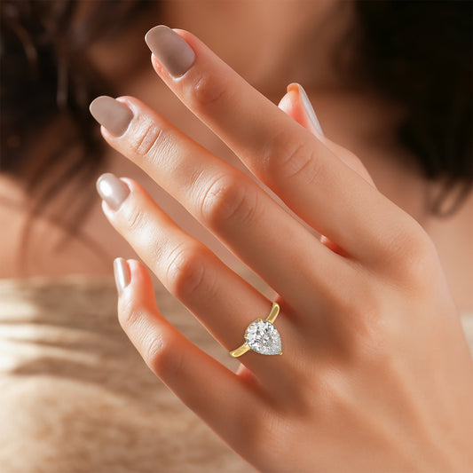 hidden halo pear shaped diamond ring