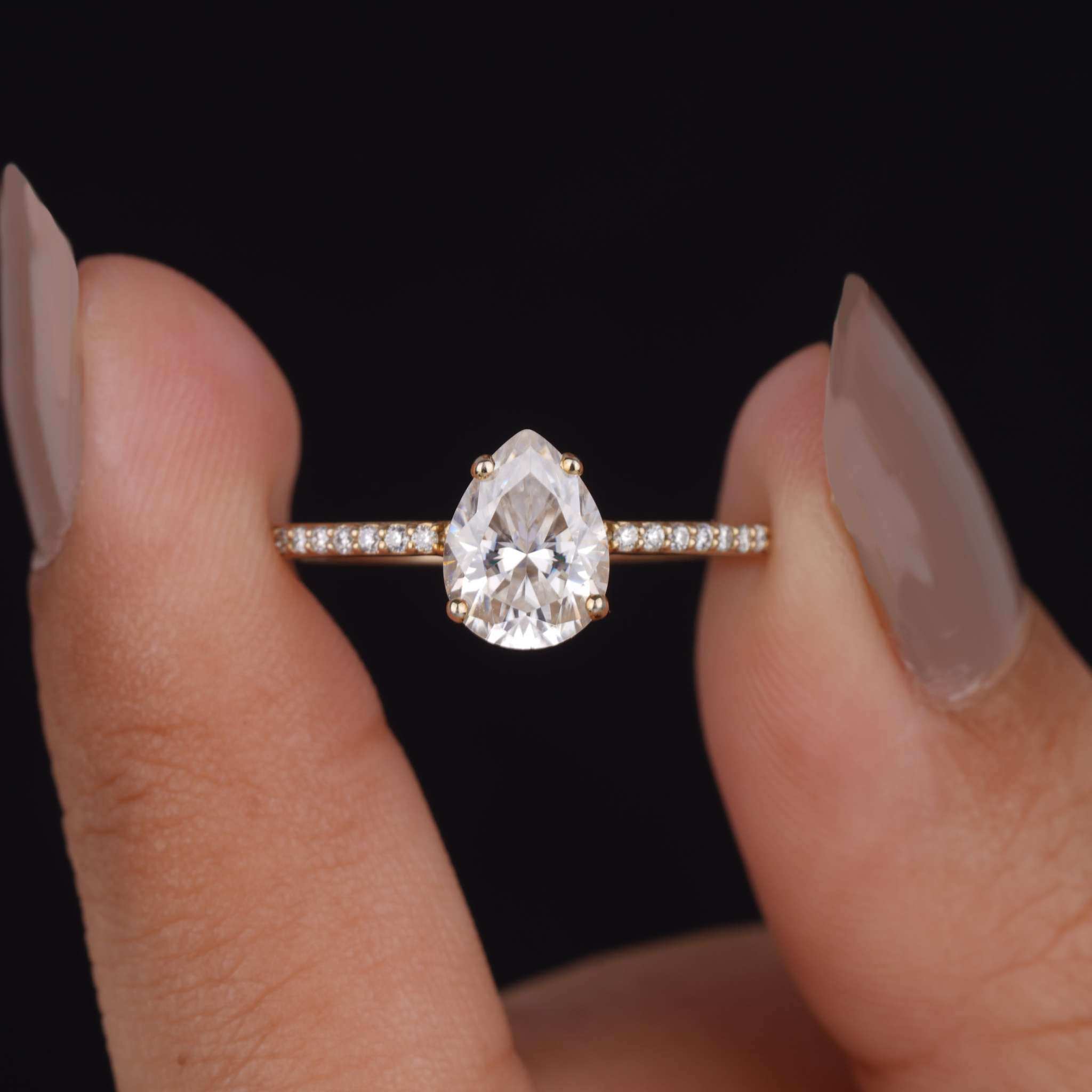 Pear Moissanite Solitaire Pave Set Engagement Ring Nine